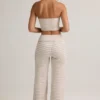 Pantaloni a vita media con risvolto in Modal Melida a righe rosa e gialle Pantaloni a vita media con risvolto in Modal Melida a righe rosa e gialle