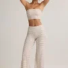 Pantaloni a vita media con risvolto in Modal Melida a righe rosa e gialle Pantaloni a vita media con risvolto in Modal Melida a righe rosa e gialle