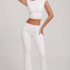 Pantaloni a vita media e gamba dritta Hollis in bianco Pantaloni a vita media e gamba dritta Hollis in bianco