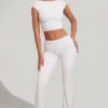 Pantaloni a vita media e gamba dritta Hollis in bianco Pantaloni a vita media e gamba dritta Hollis in bianco