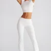 Pantaloni a vita media e gamba dritta Hollis in bianco Pantaloni a vita media e gamba dritta Hollis in bianco