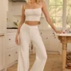 Pantaloni a vita media e gamba dritta Libby Pointelle in bianco Pantaloni a vita media e gamba dritta Libby Pointelle in bianco