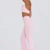Pantaloni a zampa arricciati in jersey spazzolato rosa pallido melange Pantaloni a zampa arricciati in jersey spazzolato rosa pallido melange