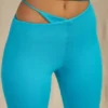 Pantaloni a zampa con cut-out Valerie Petite in acquamarina Pantaloni a zampa con cut-out Valerie Petite in acquamarina