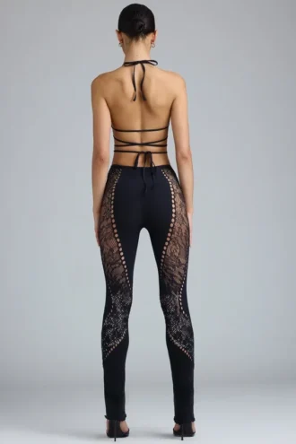 Pantaloni a zampa con decorazioni Stevie a vita media in nero