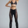 Pantaloni a zampa con decorazioni Stevie a vita media in nero Pantaloni a zampa con decorazioni Stevie a vita media in nero