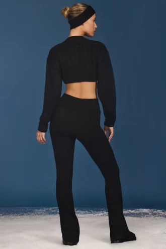 Pantaloni a zampa con risvolto in maglia a trecce, colore nero