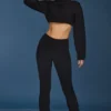 Pantaloni a zampa con risvolto in maglia a trecce, colore nero Pantaloni a zampa con risvolto in maglia a trecce, colore nero