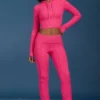 Pantaloni a zampa con risvolto in maglia a trecce rosa shocking Pantaloni a zampa con risvolto in maglia a trecce rosa shocking