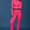 Pantaloni a zampa con risvolto in maglia a trecce rosa shocking Pantaloni a zampa con risvolto in maglia a trecce rosa shocking