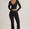 Pantaloni a zampa con risvolto in TENCEL™ Modal a coste, colore nero Pantaloni a zampa con risvolto in TENCEL™ Modal a coste, colore nero