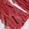 Pantaloni a zampa con vita media e volant Felicity con stampa rossa Pantaloni a zampa con vita media e volant Felicity con stampa rossa