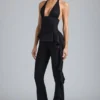 Pantaloni a zampa con volant metallizzati Reese in nero Pantaloni a zampa con volant metallizzati Reese in nero