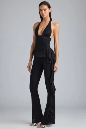 Pantaloni a zampa con volant metallizzati Reese in nero