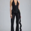 Pantaloni a zampa con volant metallizzati Reese in nero Pantaloni a zampa con volant metallizzati Reese in nero