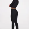 Pantaloni a zampa di elefante a vita media in Modal Philippa, colore nero Pantaloni a zampa di elefante a vita media in Modal Philippa, colore nero