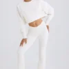 Pantaloni a zampa in jersey di cotone testurizzato, colore bianco Pantaloni a zampa in jersey di cotone testurizzato, colore bianco