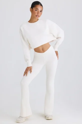 Pantaloni a zampa in jersey di cotone testurizzato, colore bianco