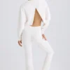 Pantaloni a zampa in jersey di cotone testurizzato, colore bianco Pantaloni a zampa in jersey di cotone testurizzato, colore bianco