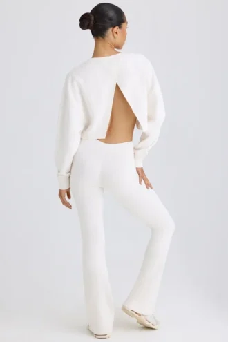 Pantaloni a zampa in jersey di cotone testurizzato, colore bianco