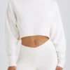 Pantaloni a zampa in jersey di cotone testurizzato, colore bianco Pantaloni a zampa in jersey di cotone testurizzato, colore bianco
