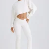 Pantaloni a zampa in jersey di cotone testurizzato, colore bianco Pantaloni a zampa in jersey di cotone testurizzato, colore bianco