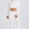 Pantaloni a zampa in jersey di cotone testurizzato, colore bianco Pantaloni a zampa in jersey di cotone testurizzato, colore bianco