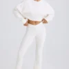 Pantaloni a zampa in jersey di cotone testurizzato, colore bianco Pantaloni a zampa in jersey di cotone testurizzato, colore bianco