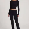 Pantaloni a zampa Vevina in Modal a vita media, colore nero Pantaloni a zampa Vevina in Modal a vita media, colore nero