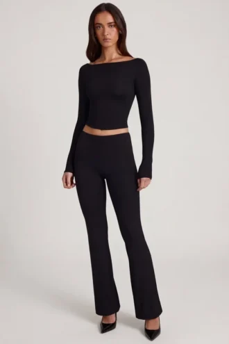 Pantaloni a zampa Vevina in Modal a vita media, colore nero