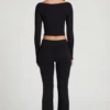 Pantaloni a zampa Vevina in Modal a vita media, colore nero Pantaloni a zampa Vevina in Modal a vita media, colore nero