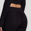 Pantaloni a zampa Vevina in Modal a vita media, colore nero Pantaloni a zampa Vevina in Modal a vita media, colore nero
