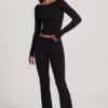 Pantaloni a zampa Vevina in Modal a vita media, colore nero Pantaloni a zampa Vevina in Modal a vita media, colore nero