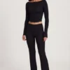 Pantaloni a zampa Vevina in Modal a vita media, colore nero Pantaloni a zampa Vevina in Modal a vita media, colore nero