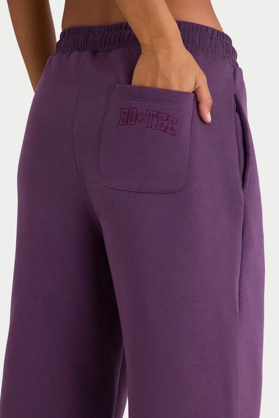 Pantaloni da jogging a gamba larga in jersey spazzolato color prugna Pantaloni da jogging a gamba larga in jersey spazzolato color prugna