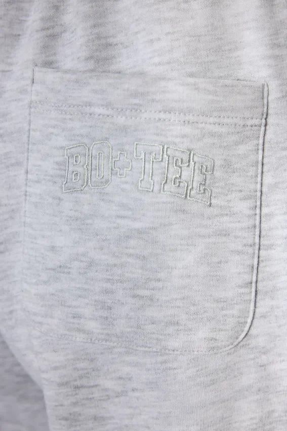 Pantaloni da jogging a gamba larga in jersey spazzolato grigio melange Pantaloni da jogging a gamba larga in jersey spazzolato grigio melange