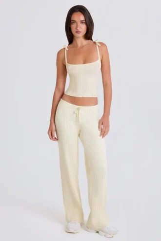 Pantaloni da jogging a gamba larga in maglia a costine color crema