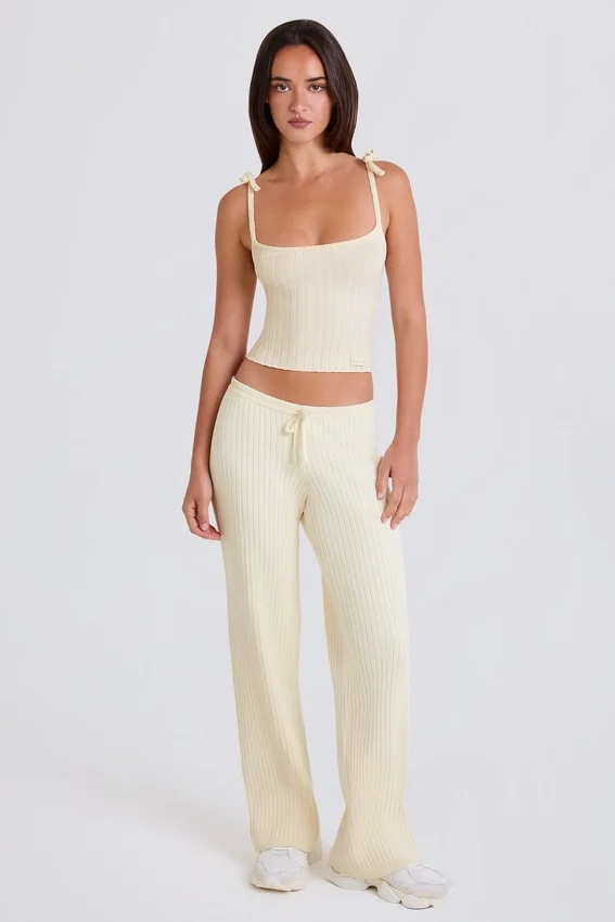 Pantaloni da jogging a gamba larga in maglia a costine color crema Pantaloni da jogging a gamba larga in maglia a costine color crema
