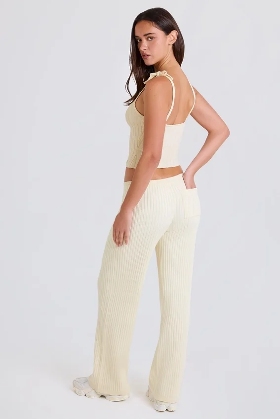 Pantaloni da jogging a gamba larga in maglia a costine color crema Pantaloni da jogging a gamba larga in maglia a costine color crema