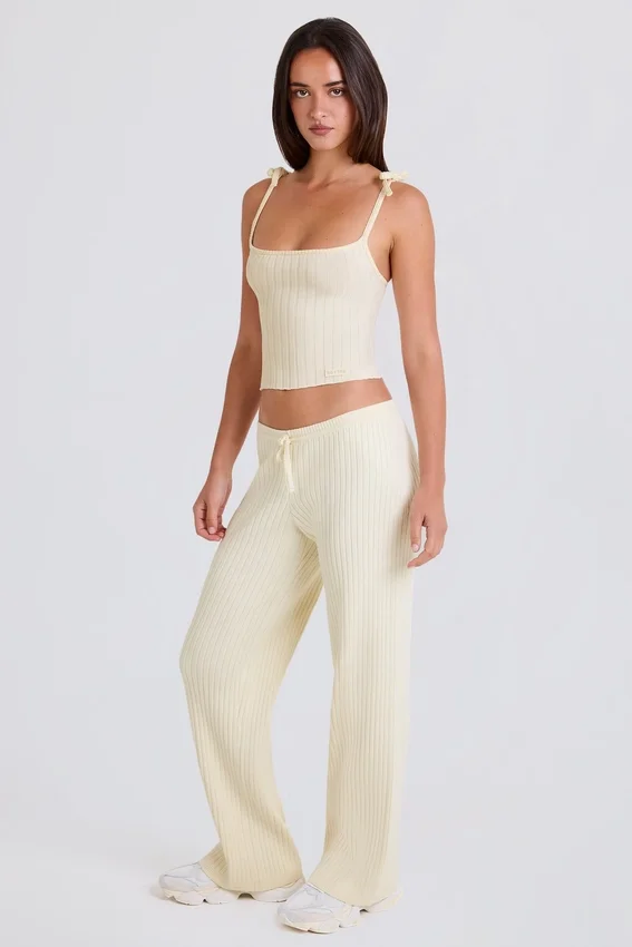 Pantaloni da jogging a gamba larga in maglia a costine color crema Pantaloni da jogging a gamba larga in maglia a costine color crema