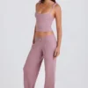 Pantaloni da jogging a gamba larga in maglia a costine color malva Pantaloni da jogging a gamba larga in maglia a costine color malva