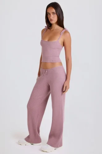 Pantaloni da jogging a gamba larga in maglia a costine color malva
