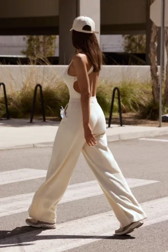 Pantaloni da jogging a gamba larga in spugna color crema