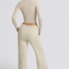 Pantaloni da jogging a vita bassa e gamba larga in color osso