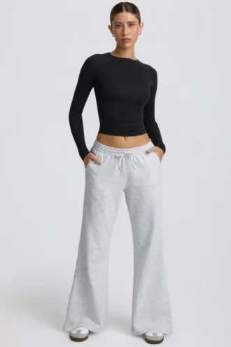 Pantaloni da jogging a vita bassa e gamba larga in grigio melange Pantaloni da jogging a vita bassa e gamba larga in grigio melange