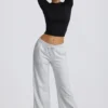 Pantaloni da jogging a vita bassa e gamba larga in grigio melange
