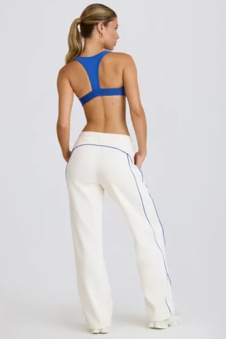 Pantaloni da jogging a vita media e gamba dritta in bianco