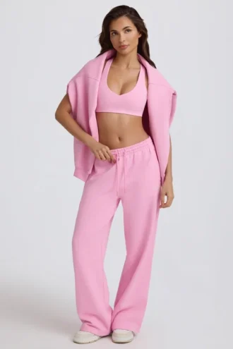 Pantaloni da jogging a vita media e gamba larga in morbido jersey di cotone, colore rosa confetto