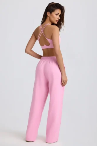 Pantaloni da jogging a vita media e gamba larga in morbido jersey di cotone, colore rosa confetto