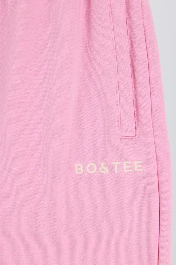 Pantaloni da jogging a vita media e gamba larga in morbido jersey di cotone, colore rosa confetto Pantaloni da jogging a vita media e gamba larga in morbido jersey di cotone, colore rosa confetto